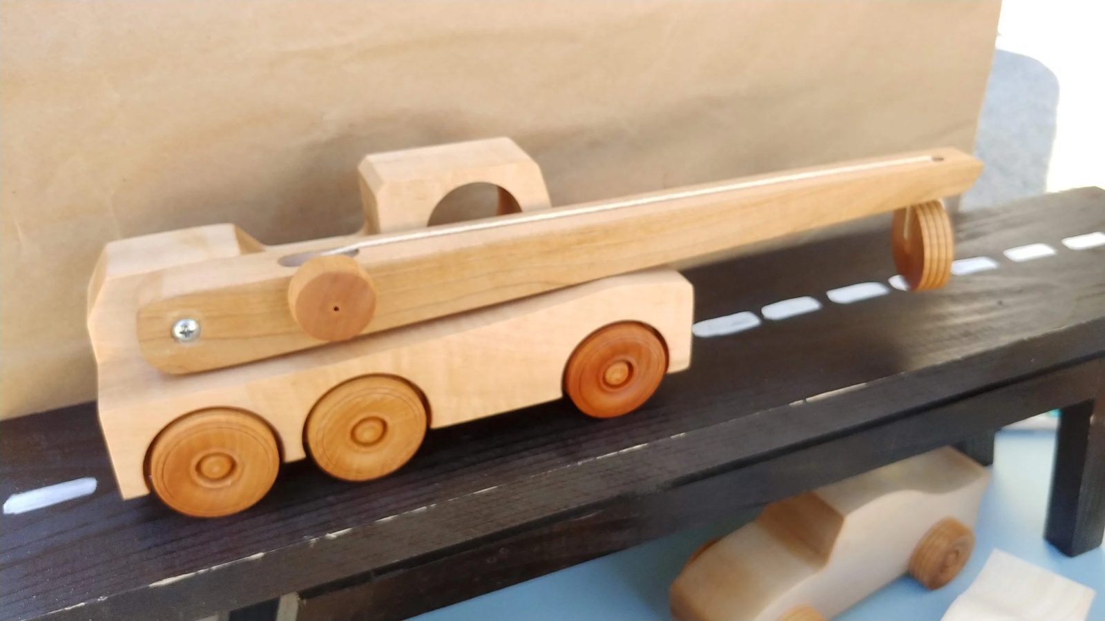 Wooden toy vehicles lined up