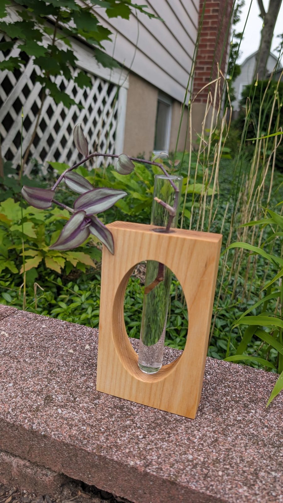 A hardwood bud vase