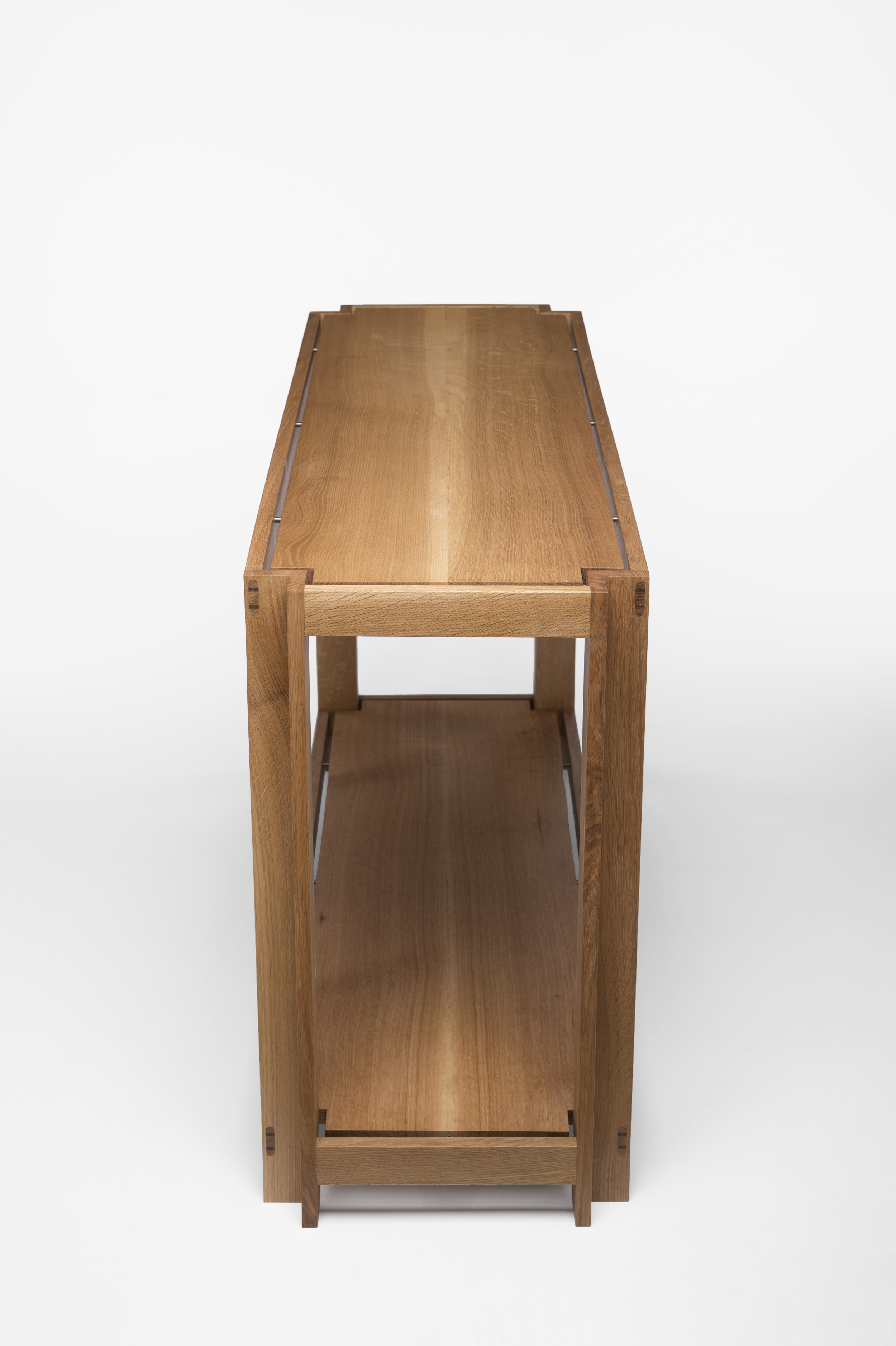 The 6yt sofa table in white oak, steel and walnut